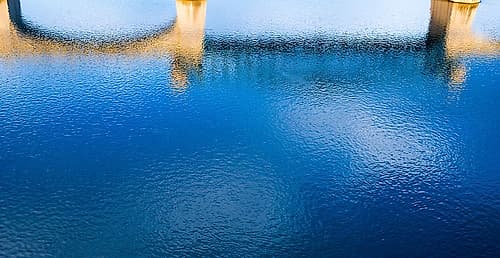 Market Bridge River Reflection Art Print by Rachel Lee