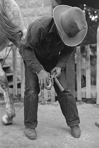 Farmer Shoeing a Horse Art Print