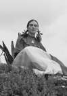 Frida Kahlo seated in the desert Art Print