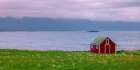 Beach hut on Lofoten coastline, Norway Art Print