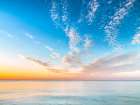 Calm beach at dusk Art Print