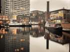 Narrow canal with small boats in Birmingham, UK Art Print