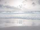 Tranquil beach with cloudscape Art Print