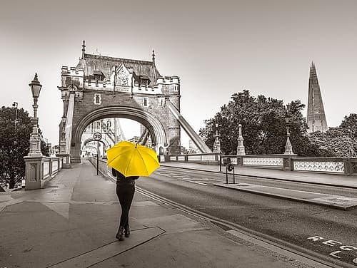 Lady with a yellow umbrella, Tower bridge, London Art Print