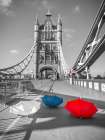 Colorful umbrellas on Tower bridge, London, UK Art Print