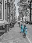 Bicycle parked on the sidewalk-Amsterdam Art Print