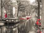 Canal through Amsterdam city Art Print
