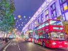 London street decorated with Christmas lights Art Print