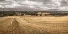 Haystack on fields Art Print