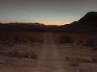 Road through desert at night Art Print