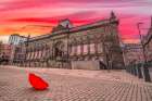Red umbrella outside-city museum Art Print
