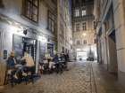Evening view of street cafe in Vienna, Austria Art Print