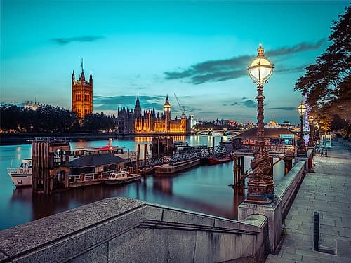 Evening view of the houses of parliament from across the river thames, with a leading steps Photography Print