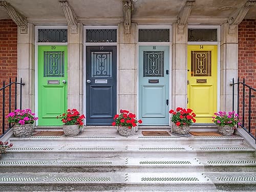Multicolored doors of residential building, London Art Print