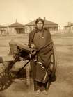 Oglala Sioux Plenty Horse Next to Cannon