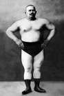 Bodybuilder in Hands on Hips Pose