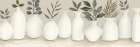 Ivory Vases in a Row Art Print