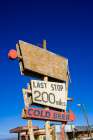 Rusty Road Sign For A Tavern And Cold Beer In A Desert Area. Ouarzazate, Morocco Art Print