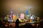 A Person Silhouetted Against A Vibrant City Skyline At Night With Colorful Lights. Shanghai, China Art Print