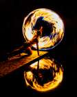 Fire Dancer Performing With A Fire Hoop At Night, Reflecting On Water. Wa, USA Art Print