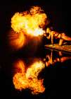 A Performer Breathes Fire, Creating A Dramatic Reflection On The Dark Water Surface. Wa, USA Art Print