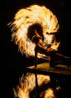Performer Spins Fire Poi, Creating Vibrant Light Trails Against A Dark Background. Wa, USA Art Print