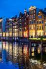 Europe, Netherlands, Amsterdam. Damrak. Beautiful Facades Of Houses On The Canal Art Print
