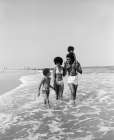 1970S African American Family Man Father Woman Mother Two Boys Sons Wading In Surf Walking Beach Art Print