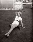 1950S Exhausted Woman Wearing White Short Shorts Lying On Top Of A Push Lawn Mower Looking At Camera Art Print