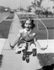 1950S Girl Jumping Rope On Sidewalk Art Print