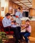 Vintage Photograph. Family Bonding Over Music And Coffee In A Cozy Kitchen Setting. Art Print