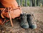 A Detail Of A Pack And Hiking Boots On A Forest Floor In The Woods Art Print
