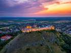 Sumeg Castle Drone View Illuminating At Sunset In Hungary Art Print