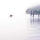 Man Paddles A Kayak Near A Dock On Lake Sebago Near Portland, Maine (Hi-Key) Art Print