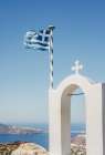 The Greek Flag Against The Blue Sea Art Print by Katerina Samailovich