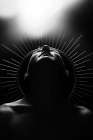 Person With Radiant Headpiece Looking Upwards In Black And White Art Print