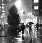 A Couple Walks Down Broadway St In Cambridge Massachusetts During A Snow Storm Art Print