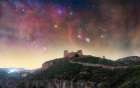 Orion And Nebulas Illuminate The Sky Above Chirel Castle Art Print