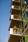 Fashion Model In A Black Bathing Suit Poses On The Balcony Of A Hotel Room In San Diego, California. Art Print