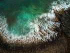 Stunning Aerial View Of Pristine Ocean Waves Crashing On Rocky Shoreline - Explore Natures Beauty Art Print