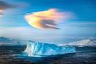 Breathtaking Antarctic Iceberg Under Dramatic Sky: Discover The Majestic Beauty Of Polar Landscapes Art Print