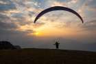 Experience Thrill Of Paragliding Amidst Breathtaking Sunsets And Mountain Views - Enthusiasts! Art Print