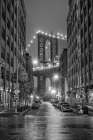 Explore The Iconic Manhattan Bridge At Night: A Breathtaking View From Dumbo Art Print