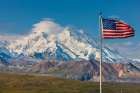 American Flag Flies At Eielson Visitors Center With Summit Of Denali Visible In Distance, Alaska. Art Print