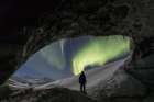 Northern Lights Are Visible From Inside A Glacier Ice Cave In The Alaska Range, Interior, Alaska. Art Print