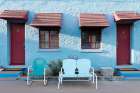 Tucumcari,New Mexico. Famous Blue Swallow Motel On Route 66. Motel Exterior With Old Metal Chairs Art Print