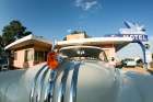 Tucumcari,New Mexico. Famous Blue Swallow Motel On Route 66 With Old Car Parked In Front. Art Print