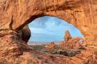 USA, Utah, Arches National Park. Distant Turret Arch Viewed Through North Window Arch. Art Print
