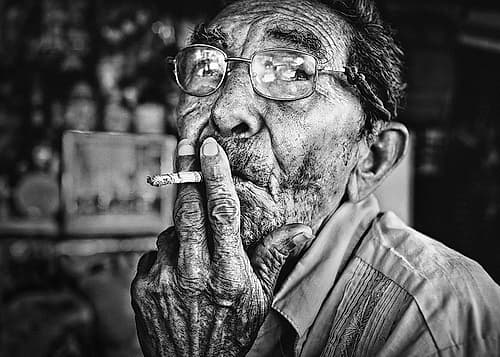 Old Man Smoking Photography Print