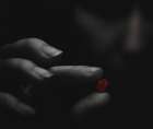 Broken red heart in the moody girls hands. Art Print by Aleksandr Sumarokov